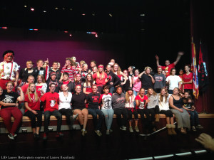 Band class wearing red, black, and bows.
