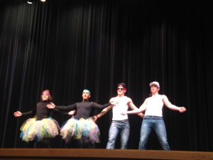 (From left to right) Steiren, Ross, Musselman, and Stores dance together.