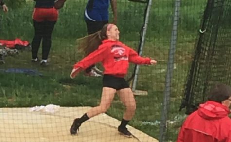 Sabrina Moxley prepares to throw the discus in finals at the Frederick County Championships. 