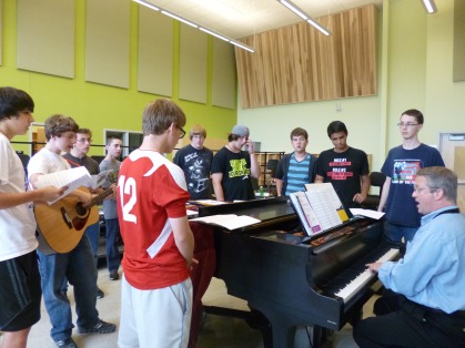 Mens acapella practicing in Mr. Dyes room Thursday.