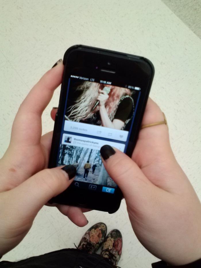 Student blogger, Olivia Goldstein (junior), scrolls through her Tumblr dashboard on the mobile app.