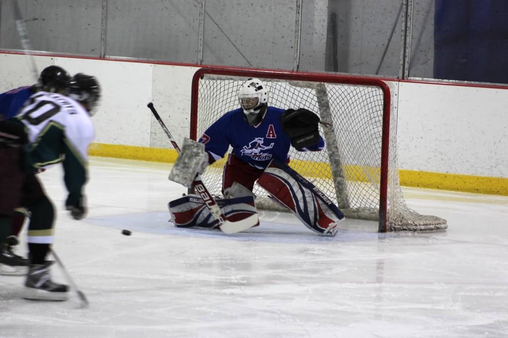 Linganore/TJ hockey goalie Devin Shields makes a pad save.

Courtesy of Mrs. Ericsson