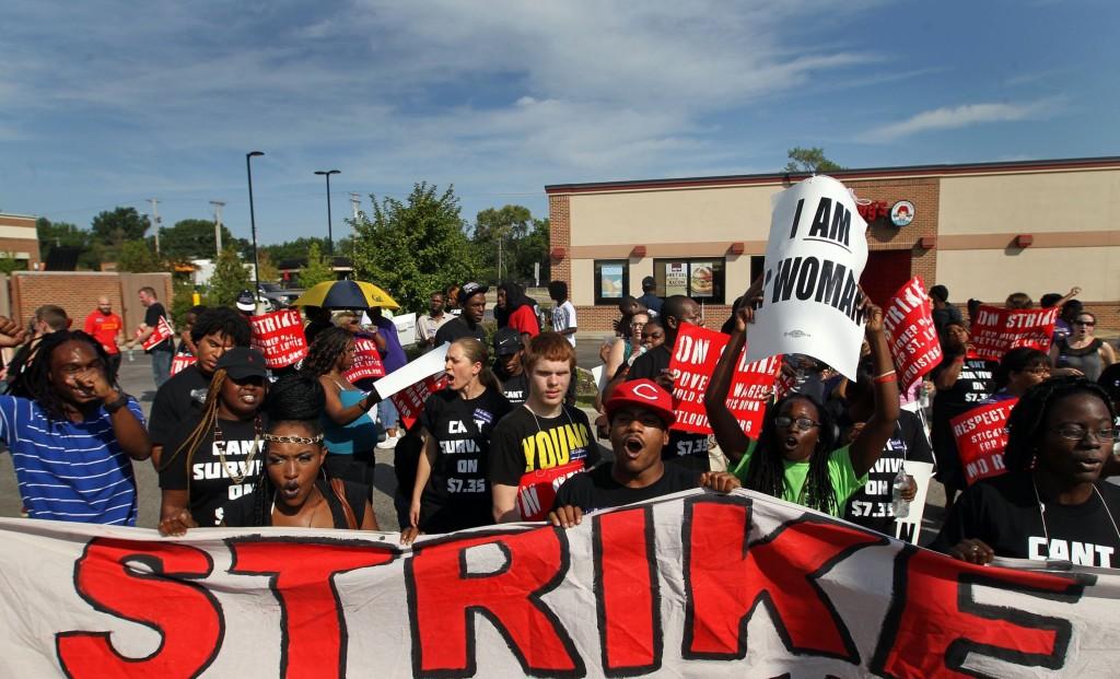 Protesters chant outside the Wendys fast food restaurant, August 29, 2013, in Rock Hill, Missouri. Organizers of the protests are demanding to two things: a minimum wage increase from $7.35 per hour to $15 per hour and the right to organize labor unions. (Laurie Skrivan/St. Louis Post-Dispatch/MCT)