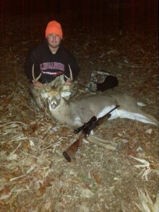 Junior, Cleveland Hall, showing off the six point buck he killed on 11/30/13