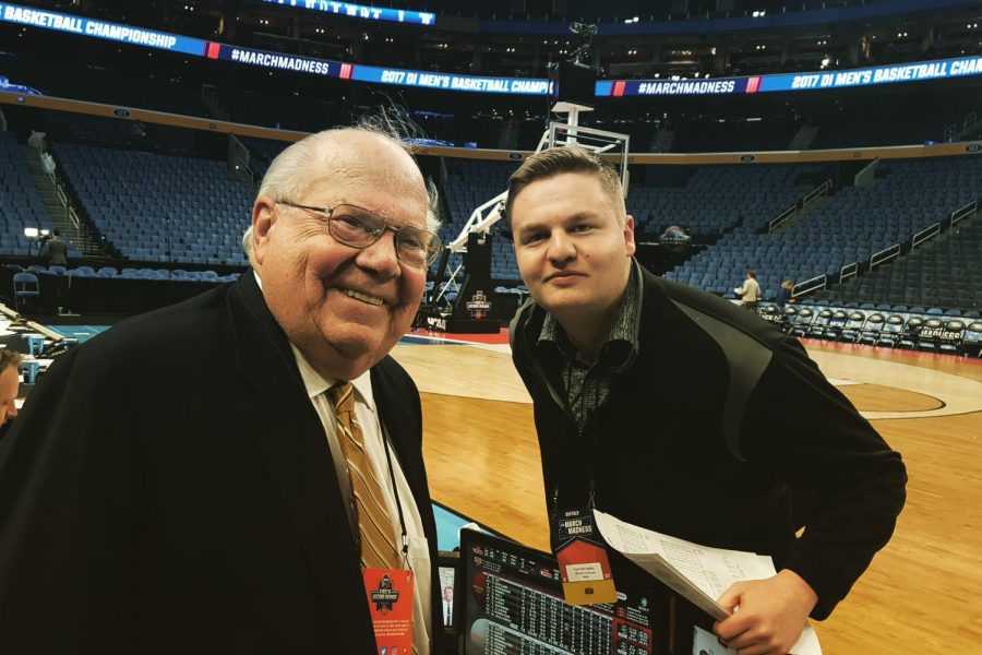 Kyle McFadden poses with CBS sports broadcaster Verne Lundquist at the 2017 NCAA mens basketball tournament in Buffalo, N.Y.