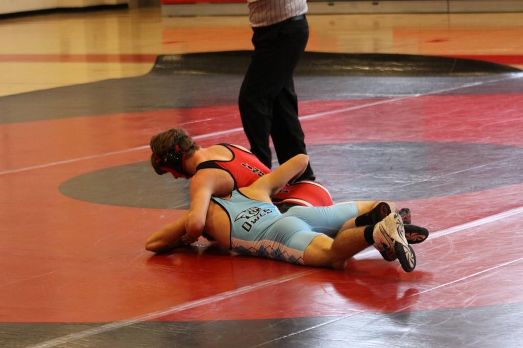 Photo of the Day 1/27/14: Yinger wrestles against Westminster