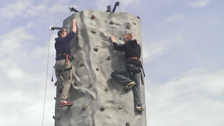 Cadets reach top of rock wall.