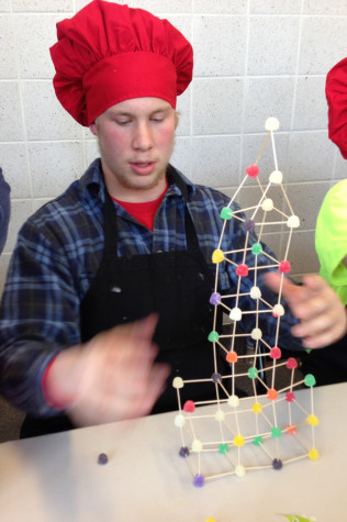 Lucas Hubbard with his gumdrop tower.