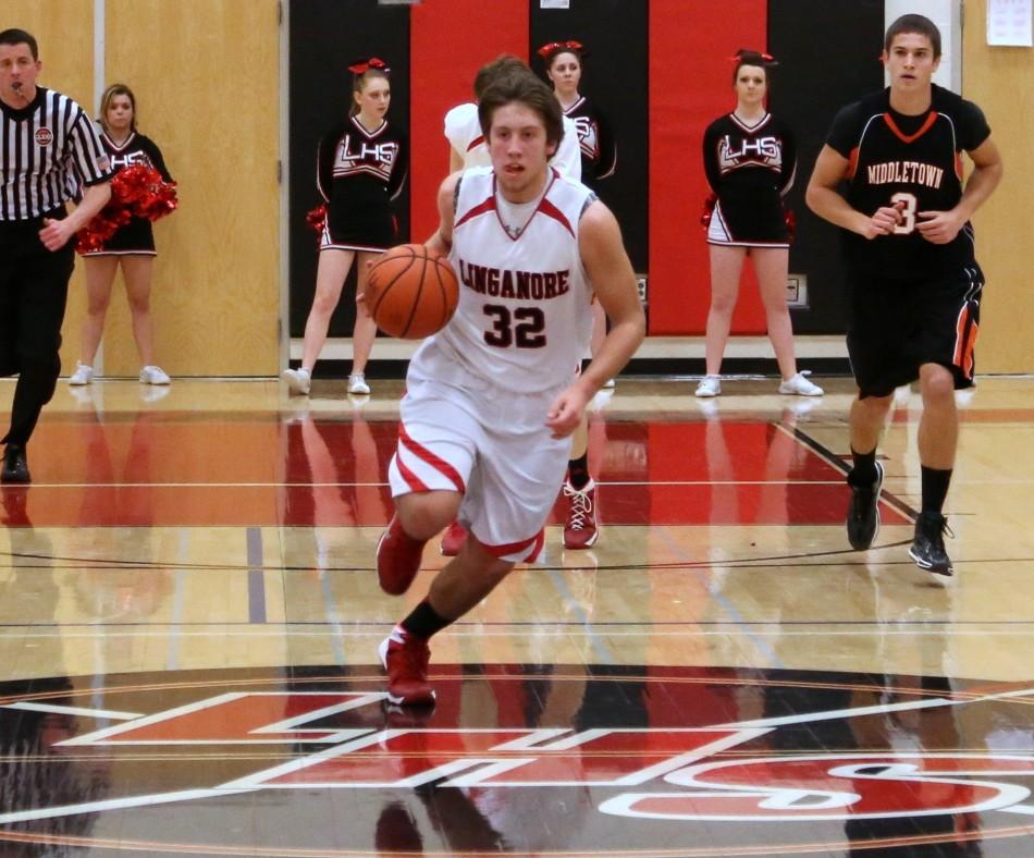 In transition, Jack (21 points) races the ball up court against Middletown. The Lancers were victorious with the final score of 67-56. Photo courtesy of Pete Austin.
