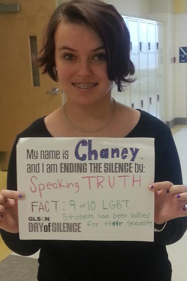 Vice President of GSA Chaney Shultz holds a sign to show what she is silent for.