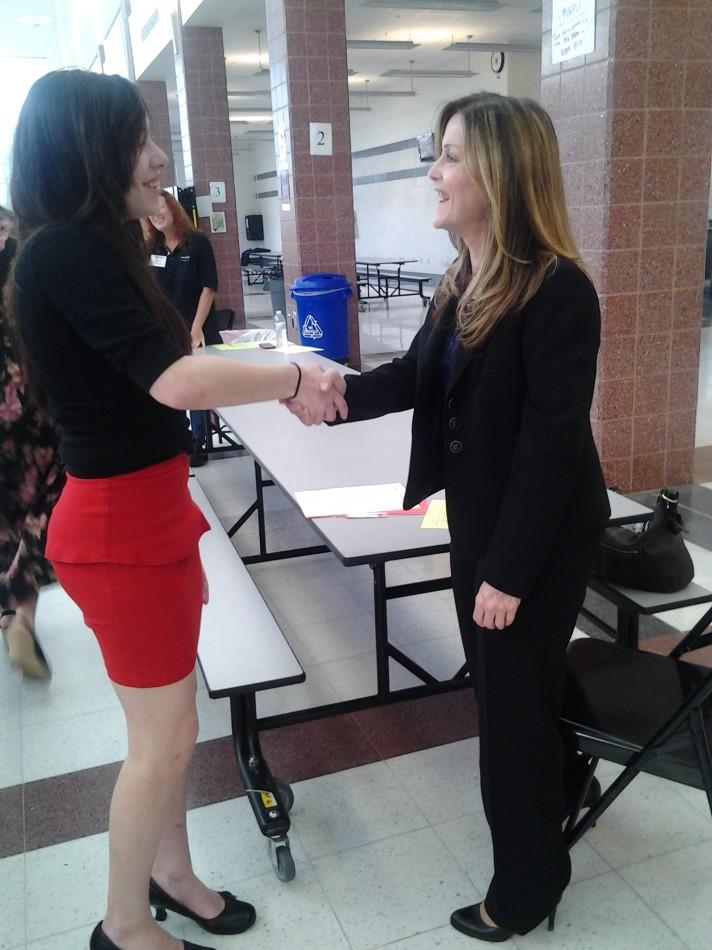 Marissa deLaViez meets Ms. Lisa Woods before their interview.