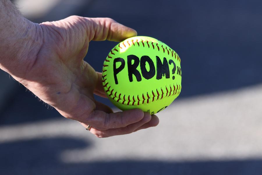 The other side of this ball says, Turn over with a smiley face.  He also presented Shelby Sadler with flowers.