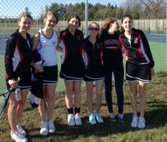 The girls first singles, second singles, first doubles and second doubles pose for a picture after playing Tuscarora. 