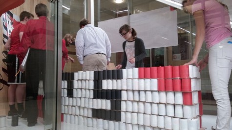 Linganore students work on the canstruction sculpture.