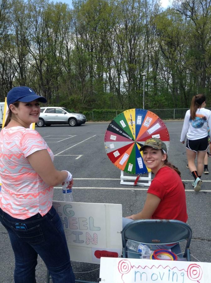 Sydney Gianguili and Sydney Garwood help out at the Green Valley Elementary School Carnival on Saturday