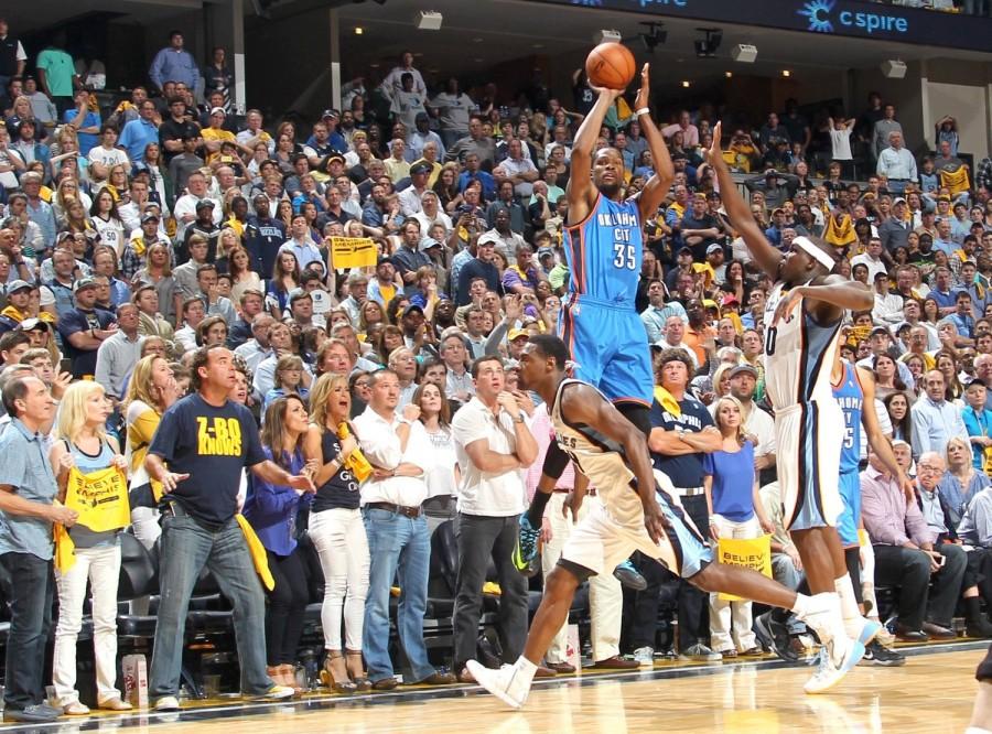 The Oklahoma City Thunder's Kevin Durant (35) attempts a 3-point shot at the buzzer against the Memphis Grizzlies' Tony Allen and Zach Randolph (50) at the end of the fourth quarter during Game 3 of a Western Conference quarterfinal at the FedExForum in Memphis, Tenn., on Thursday, April 24, 2014. Memphis won in overtime, 98-95, for a 2-1 series lead. (Nikki Boertman/The Commercial Appeal/MCT)