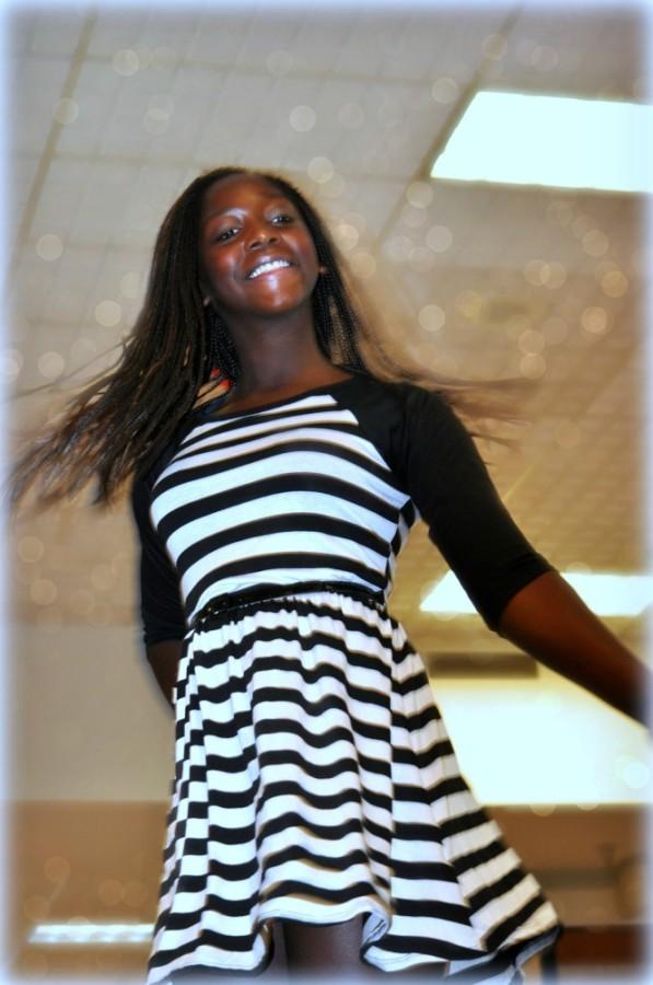 Jade Riley, rising sophomore, participating at a fashion show at FSK mall