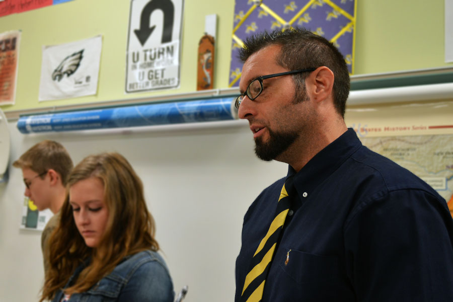 Mr. Hines teaches his AP US History class, including juniors Abigail Montgomery (center) and Jonathon Peterson (left)