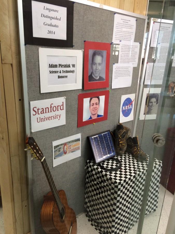 Display for Adam Plesniak, Distinguished Graduate in the Sciences. 