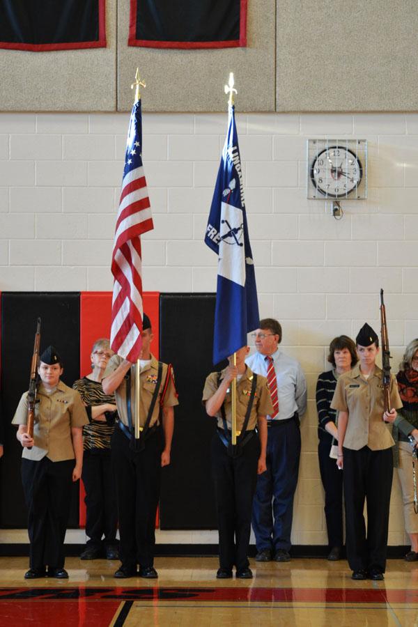 Cadets from the ROTC present the colors at Tuesdays pep rally.