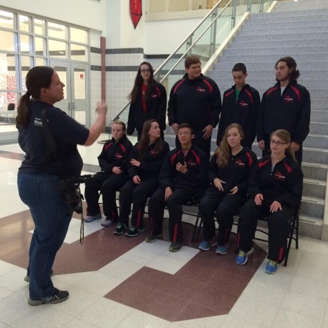 The swim team is photographed for the yearbook.