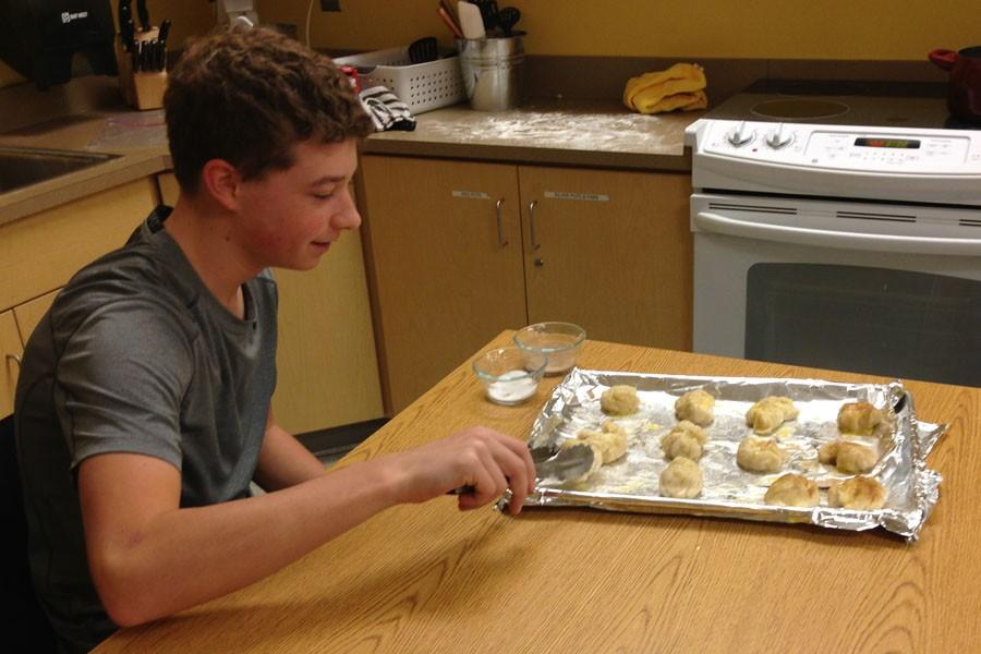 Sophomore Harrison Hewitt makes pretzels 