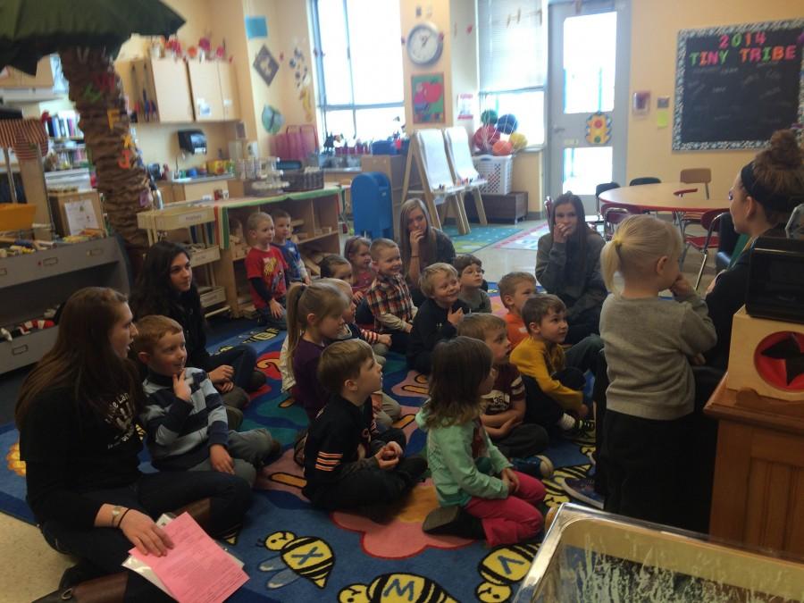 Student teachers read to Little Lancers during story time