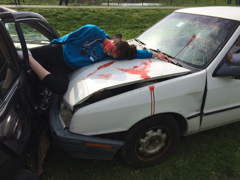 With the help of stage make up, senior Rhianna Lapen acts as the victim of a drunk driver.