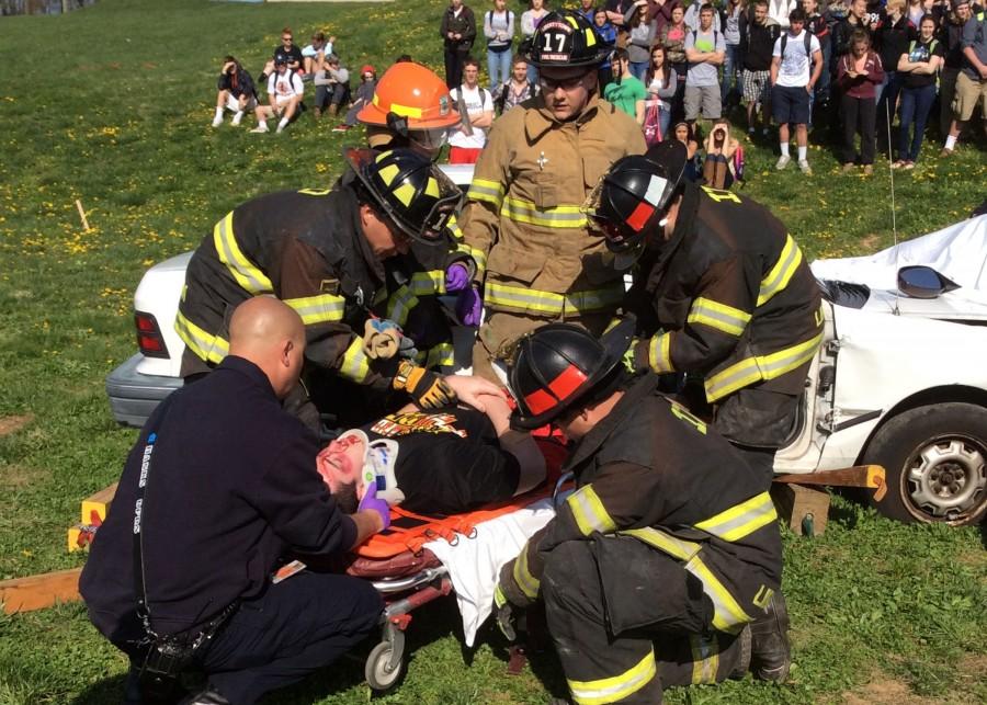 Libertytown Fire Department rescue removes Justin Knotts from the simulated crash to place him in medical care.