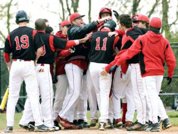Linganores baseball team congratulating each other after they beat Urbana in their 2010-2011 season
 
