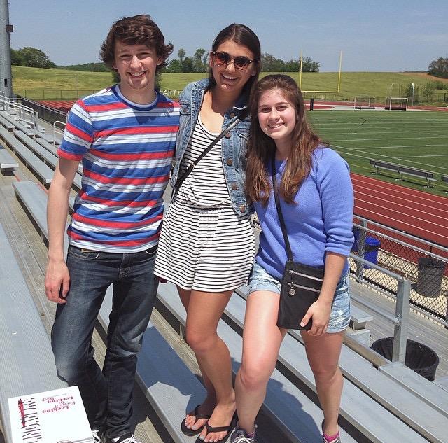 Sean Reifer, Haylie Kohn, and Elena Nicoll spend time at the picnic together.
