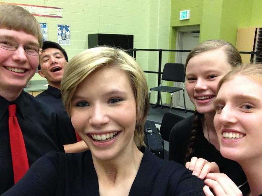 Band+students+snap+a+selfie+after+their+performance