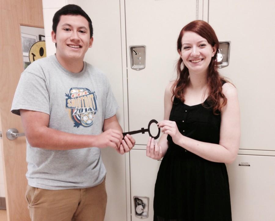 Senior International Trustee and large leader of Key Club, Liz Moore (right) passing the torch a.k.a. the key to the newest Lieutenant Governor Evan Avila (left). 