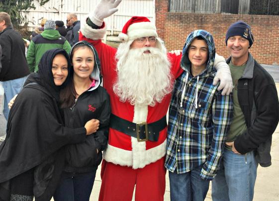 Conlon and her family pose with Santa.