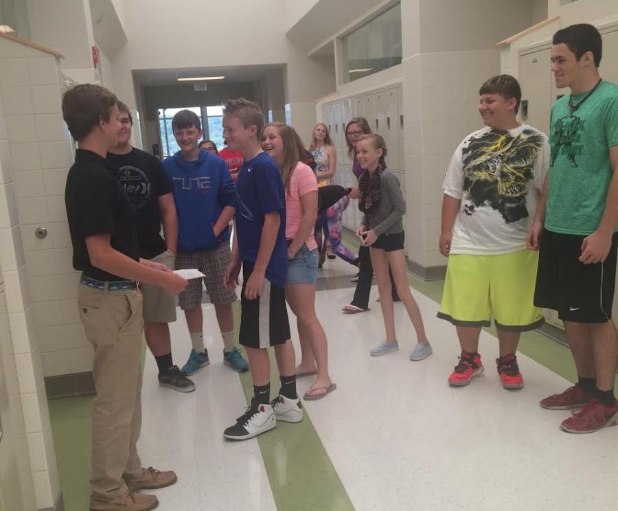 SGA Vice President Hank Beiter gives a tour to a group of 8th graders from NMMS.