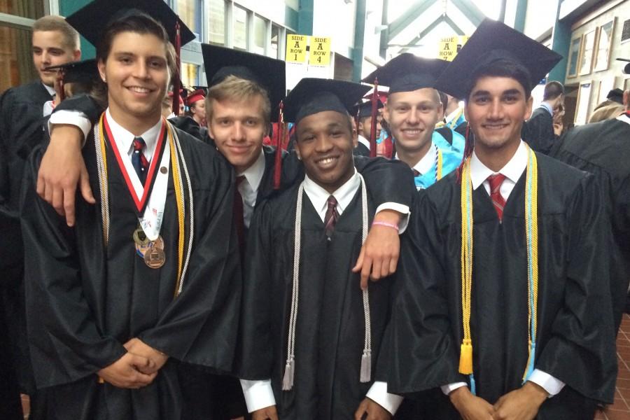 (Left to right) Casey Alvarado, Ben Flower, Darrick Edwards, Ryan Gilmartin and Neal Roberts pose before graduation. 