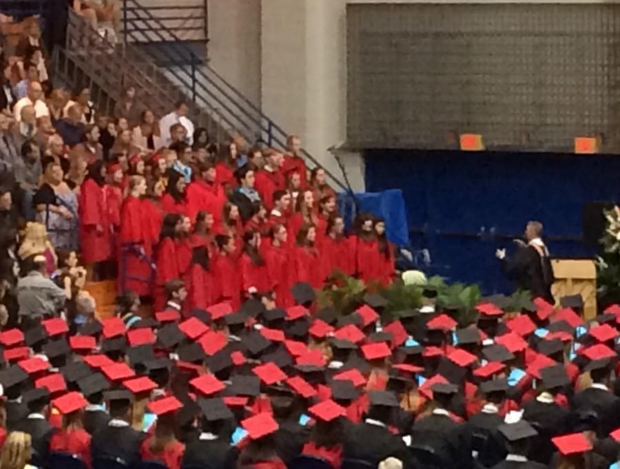 The concert choir performs at the graduation ceremony.