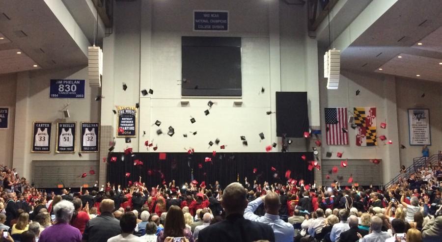 Seniors throw their caps as they are pronounced graduates.