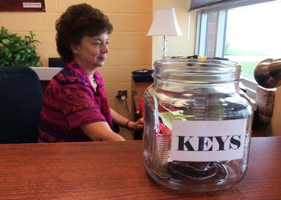 Mrs. Rice works with her jar of keys alongside her