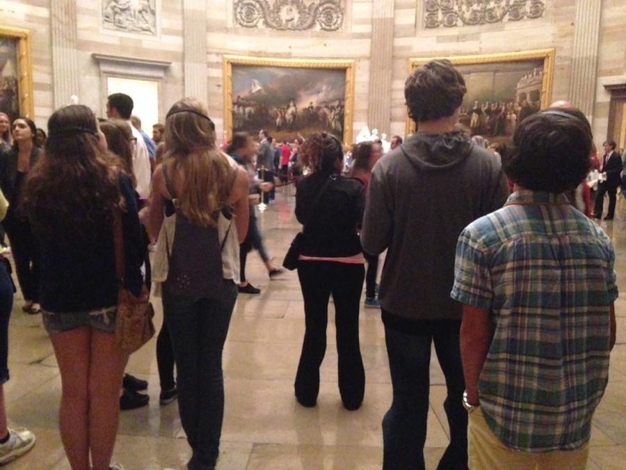 Government students admire the paintings in the Rotunda.