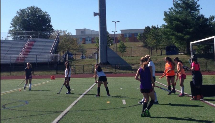 Jv field hockey team practices for their game against the Hawks. 