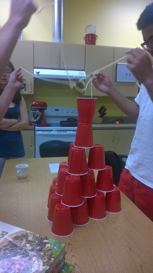 Independent Living students Keith Kurtz and Hassan Coleburn use red solo cups for a building exercise. 