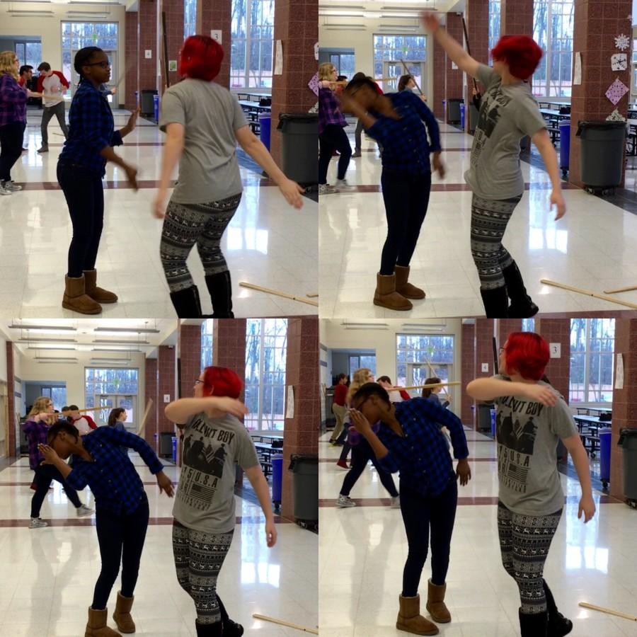 Autumn Fraiser and Presley Doughetry show off their stage combat skills.