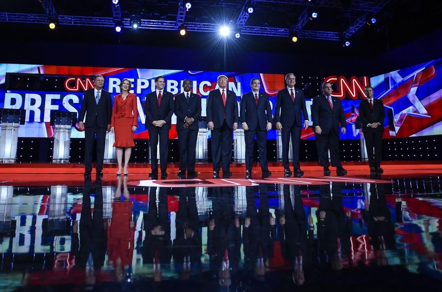 The Republican candidates for President stand side by side before the GOP debate.