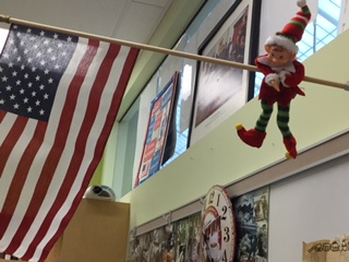 12/16: Congratulations, Mrs. Scuffins for winning the daily raffle. Newsie was swinging from the flag in Mr. Beaver's room!