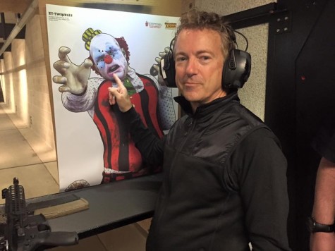 Rand Paul stands beside his Zombie Clown Target 