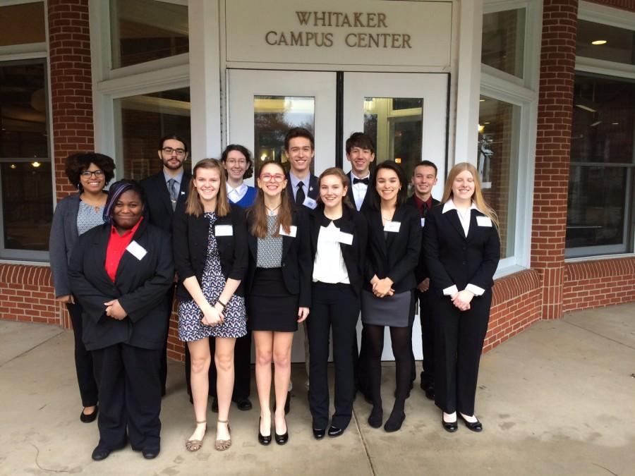 Front row: Theodora Tecle, Shannon Loughrey, Madeline Wodaski, Emily Barbagallo, Isabella Madrid, and Sam Buckman   
Back Row: Maleeha Coleburn,  Kasal Smaha, Meghan Gagne, JD Ensor, Garrett Wiehler, and Jack Adams 

The Model UN Club represents our school at Hood College for the annual county conference. 
