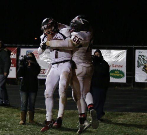 Fleagle and Mussleman celebrate after Mussleman scores the only touchdown for the Lancers in their win over Walkersville(7-6). 