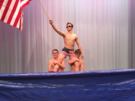 Contestants Matt Watson and Zack Yurich lift Butehorn during his Synchronized Swimming talent act. 