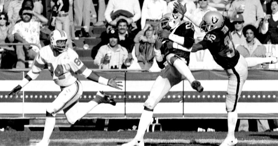 Jack Tatum, a ferocious defensive back known as The Assassin for his violent tackles, died Tuesday of a heart attack. He was 61. In this 1976 file photo, Oakland Raiders Jack Tatum, far right, goes after an interception along with teammate Skip Thomas, middle, as New England Patriots Darryl Stingley looks back at ball. (Dan Rosenstrauch/Contra Costa Times/MCT)